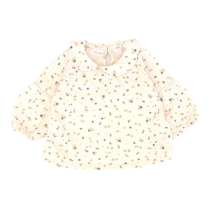 Blusa blanca de flores